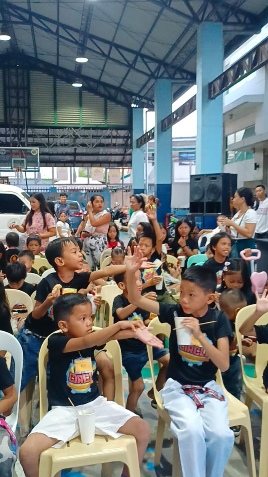 Children taking part in a community event